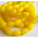 Jadeiit ovaalne 14x10mm, looduslik, värvitud kollane, ava 1mm, 1 tk